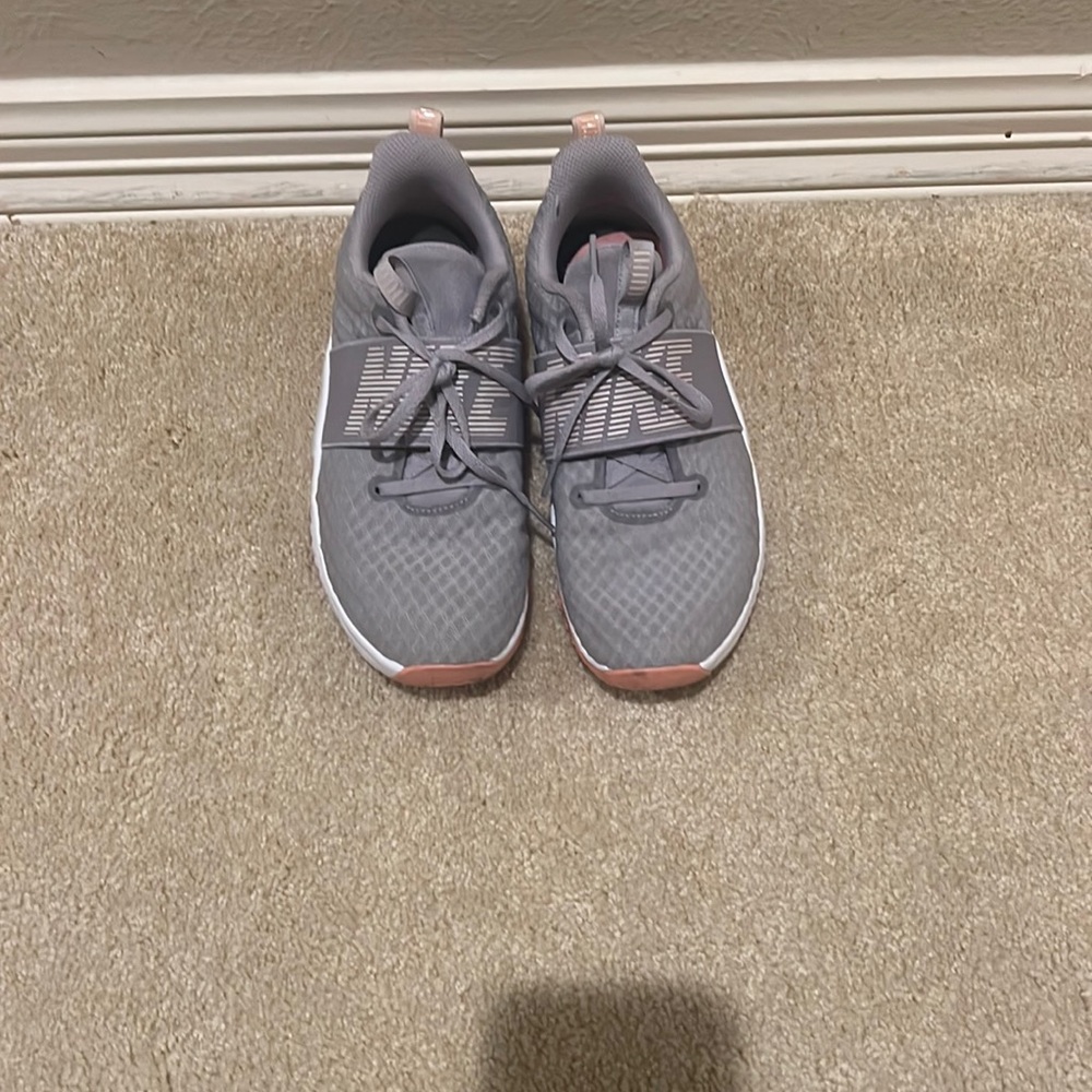 Gray and orange Nike sneakers size 8 1/2